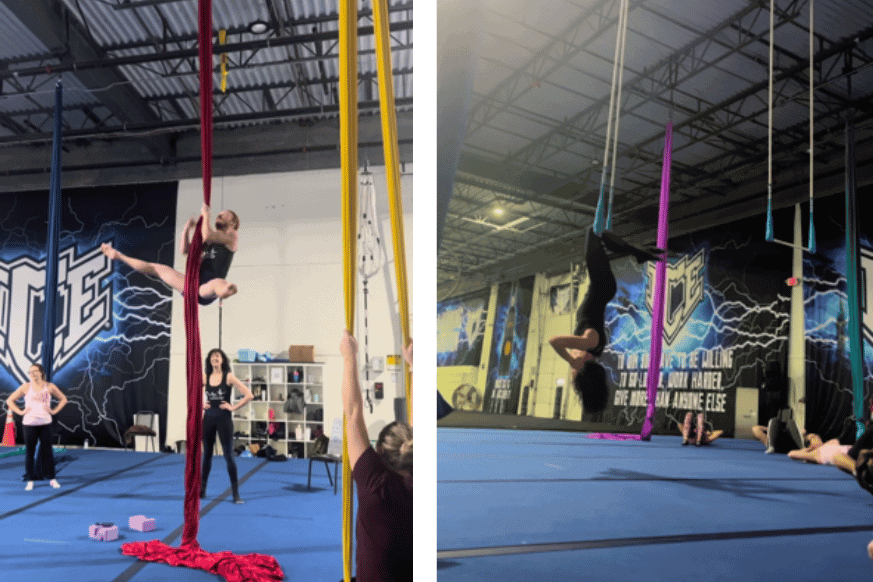 2 On the Fly coaches demonstrate advanced aerial moves.  Silk split pull up and trapeze crunches.