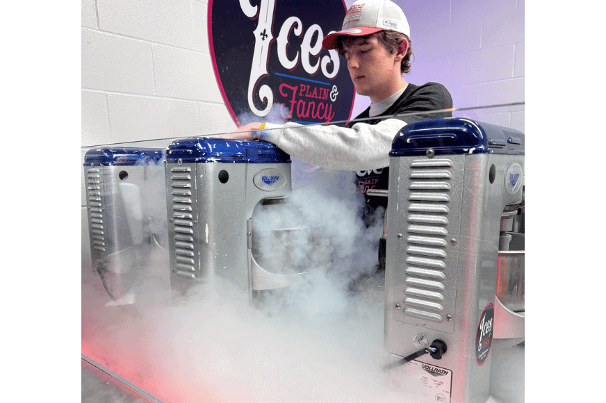 a foggy mist emiting from an ice cream mixer showing the flash freezing of ice cream using liquid nitrogen at ice's plain and fancy