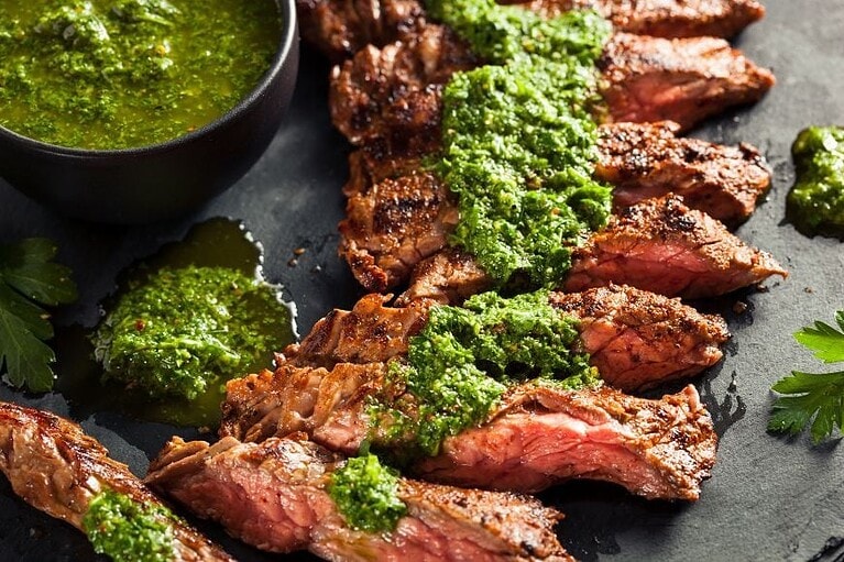 skirt steak with chimichurri sauce drizzle